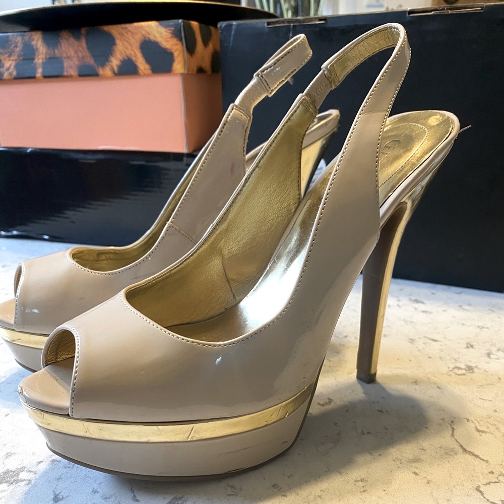 GUESS cream and gold platform heels